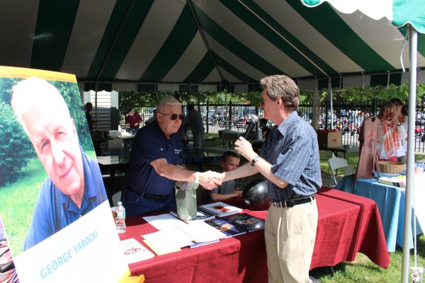 George Yarocki gets congratulated by Guy McLain 