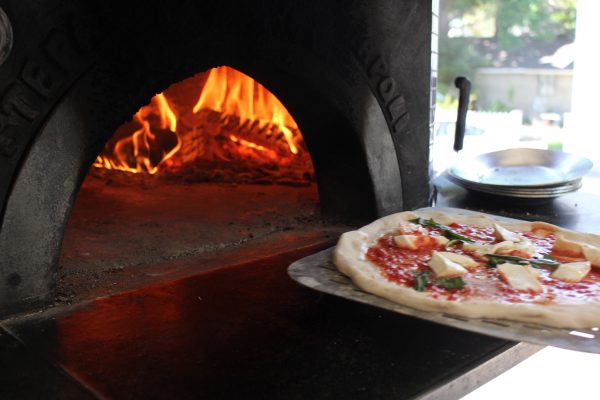 Pizza going in oven