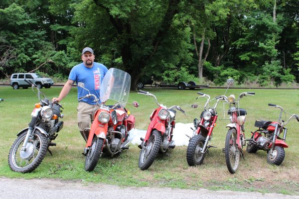 Corey Bourassa with part of his Honda collection