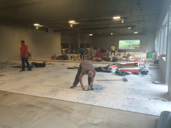 Flooring being installed