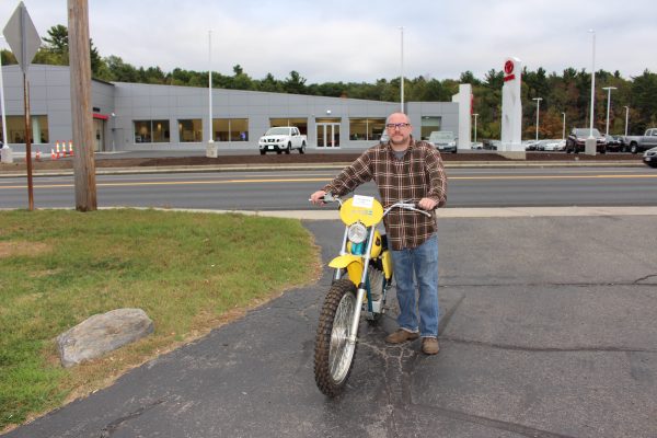 Chris North with car dealership